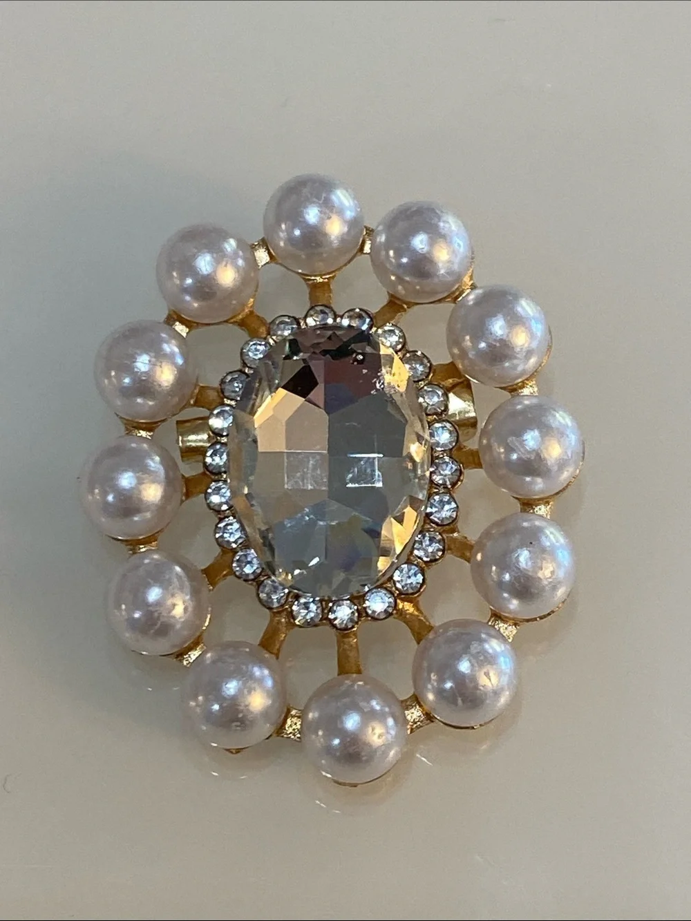 Faux pearl brooch